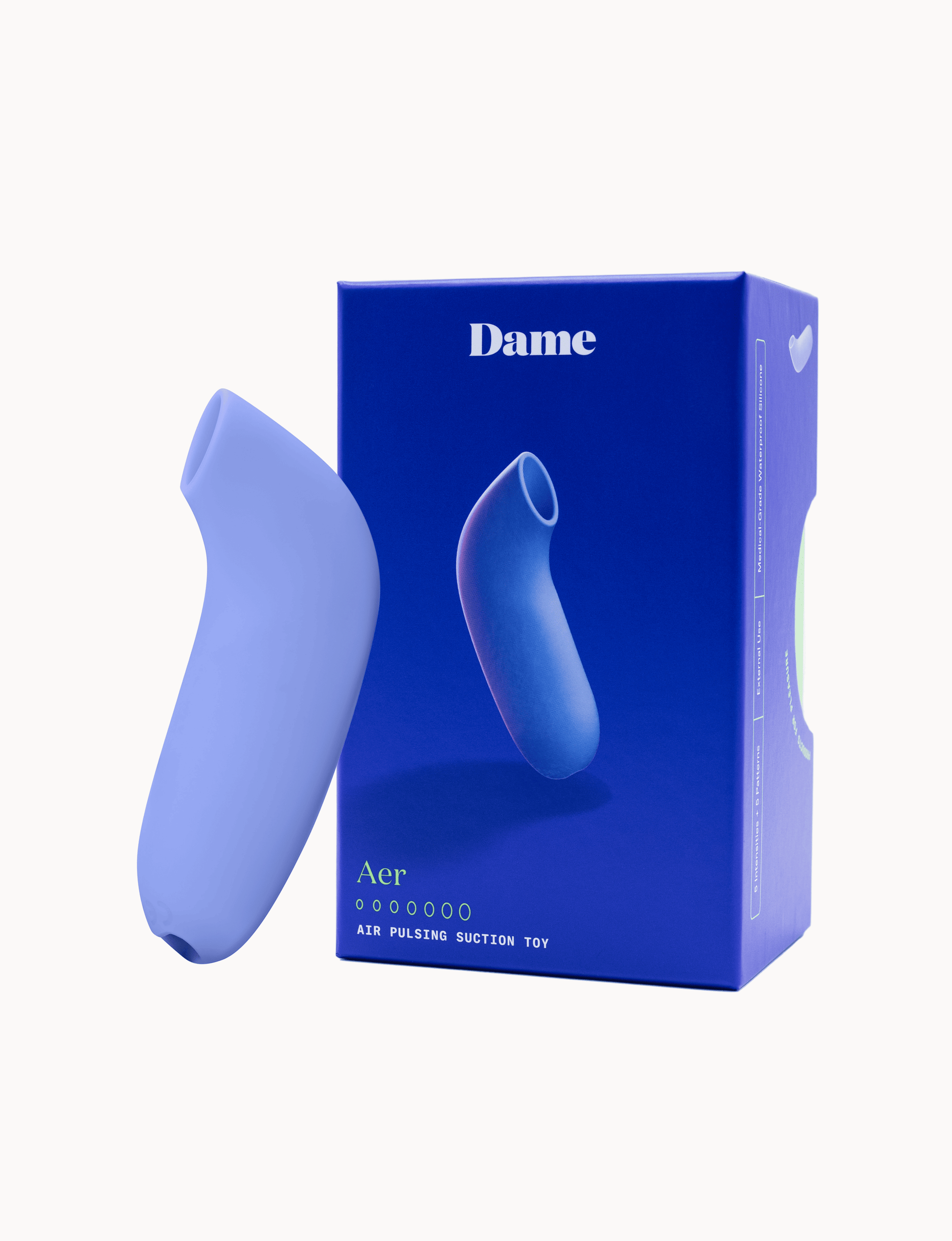 Blue personal massager twith 'Dame' packaging on a white background