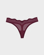 A pair of sheer mesh thong panties in a deep burgundy color, displayed flat against a light gray background.