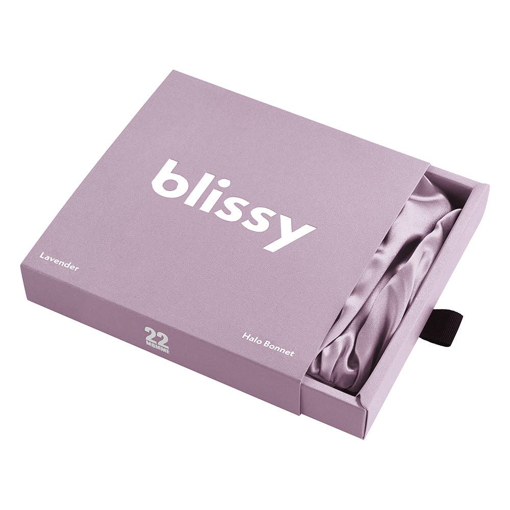 Lavender satin bonnet in a 'blissy' branded box on a white background
