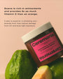 Ceremonia guava hair mask jar with guava fruit on a pink background