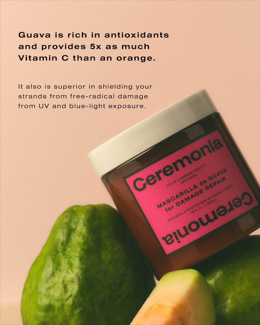 Ceremonia guava hair mask jar with guava fruit on a pink background