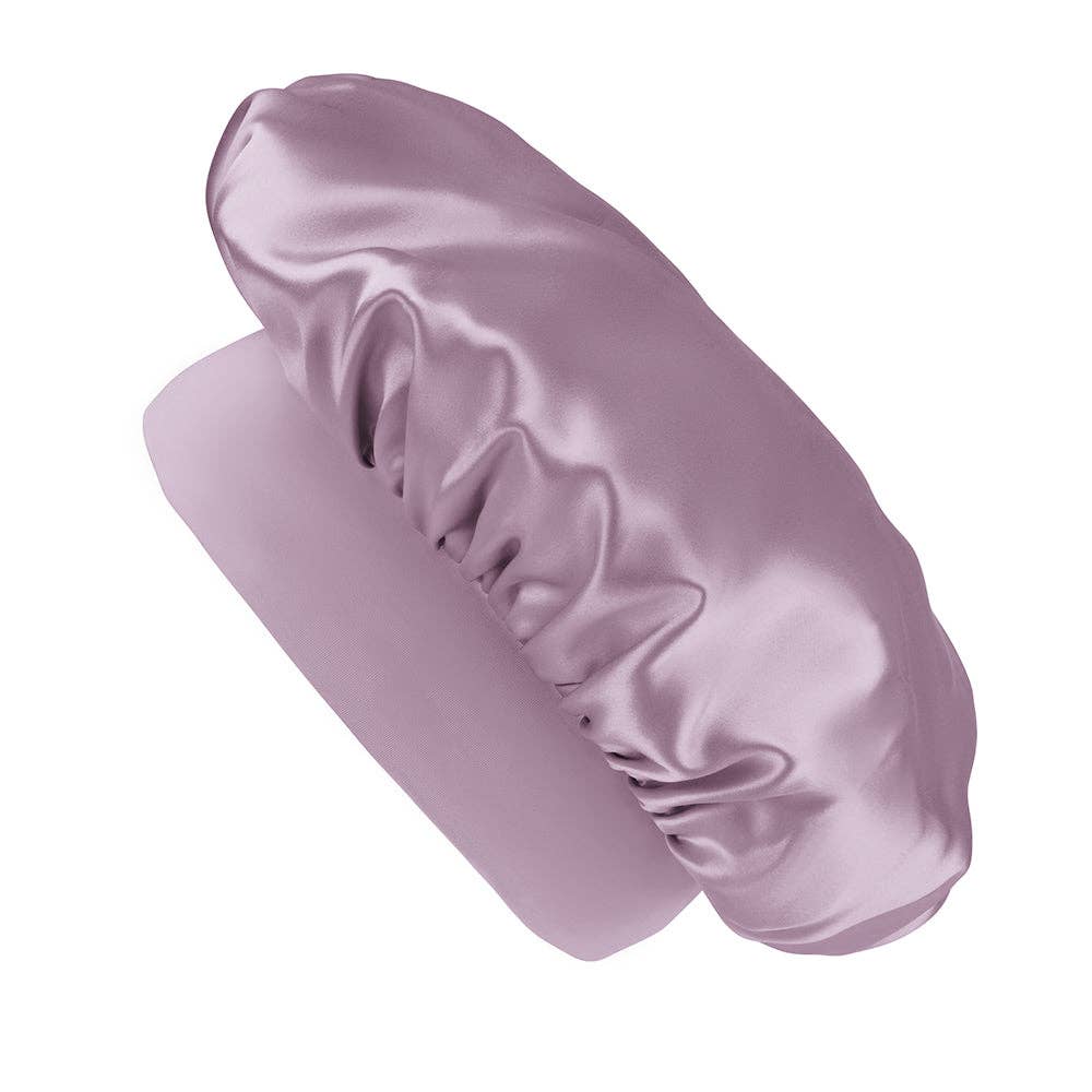 Purple satin bonnet on a white background