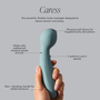 Body massager labeled 'Caress' held in a hand with features highlighted on a gray background