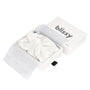 White bonnet with inside a box, branded 'blissy', on a white background