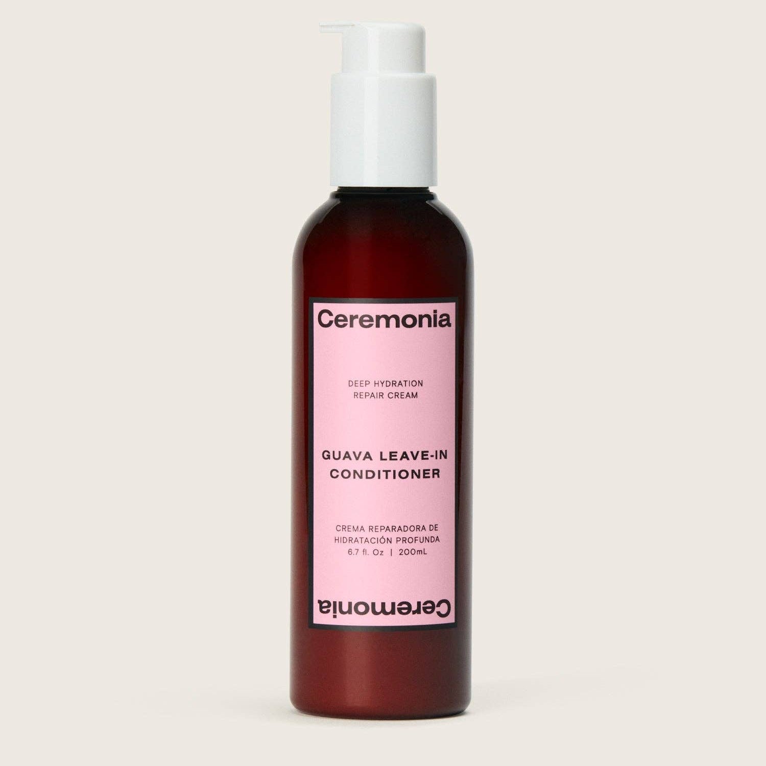 Ceremonia Guava Leave-In Conditioner bottle on a beige background