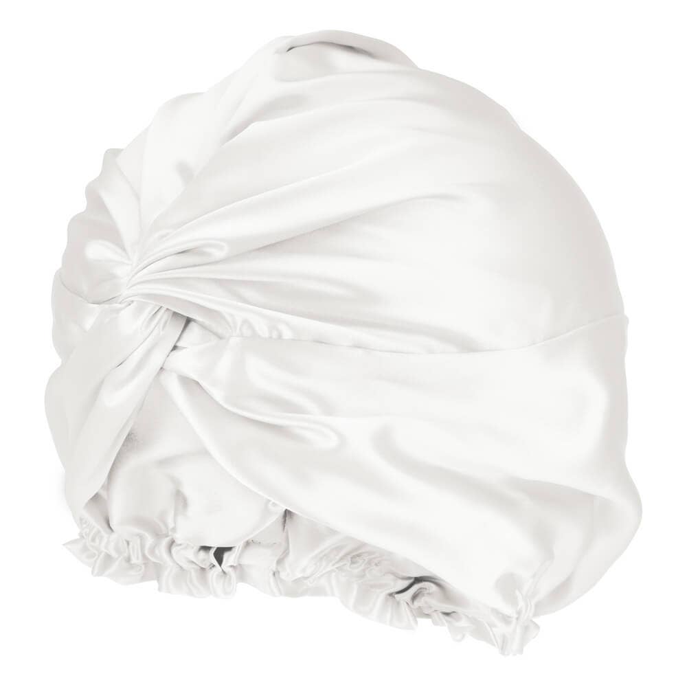 White satin bonnet on a white background