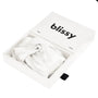 White satin bonnet in a box with 'blissy' branding on it on a white background