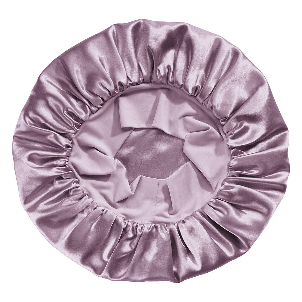 Purple satin bonnet on a white background