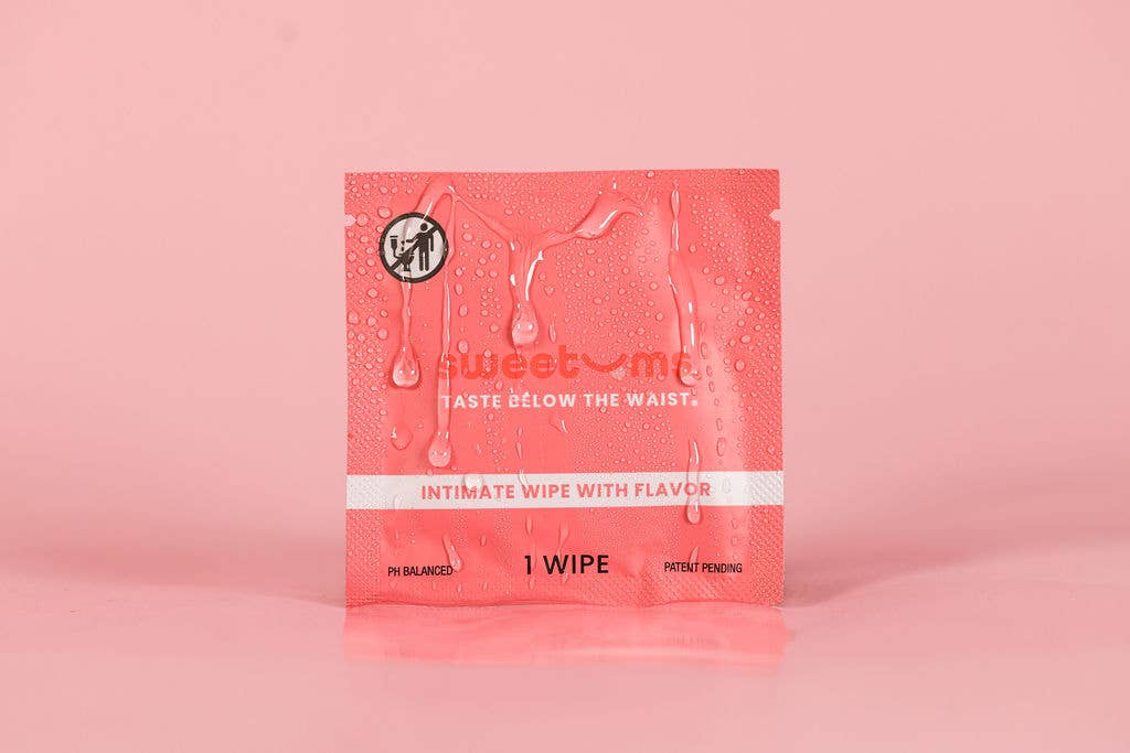 Pink package of 'sweet me' intimate wipes on a pink background