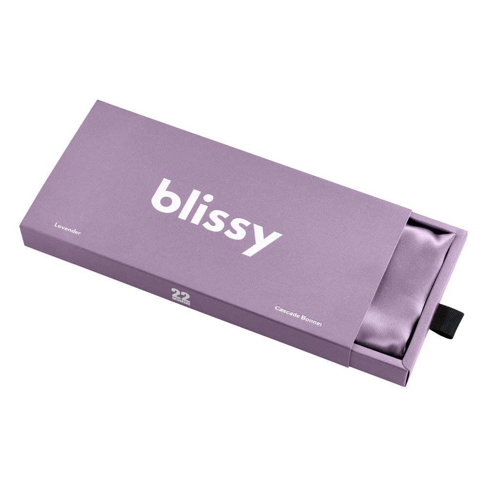 Purple packaging box with 'blissy' branding on a white background
