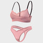 A two-piece lingerie set featuring a sheer pink mesh bralette with black underwire and adjustable straps, and a matching sheer pink mesh thong, shown against a light gray background.
