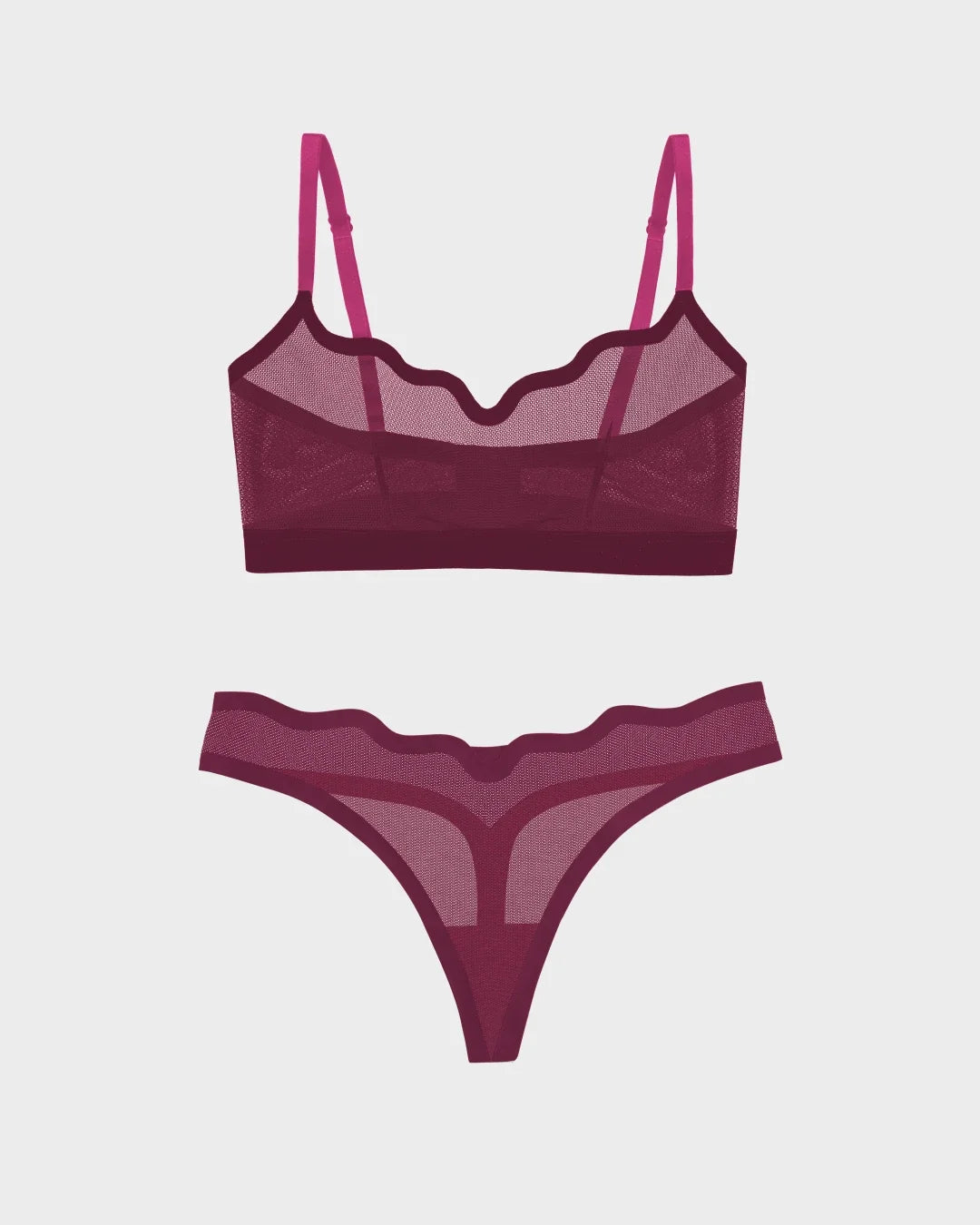 A two-piece lingerie set featuring a sheer mesh bralette and matching thong in a deep magenta color, displayed on a light gray background.