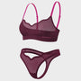 A two-piece sheer lingerie set in a deep plum purple, featuring a scalloped underwire bra with bright pink straps and matching high-cut thong bottoms, shown on a light gray background.