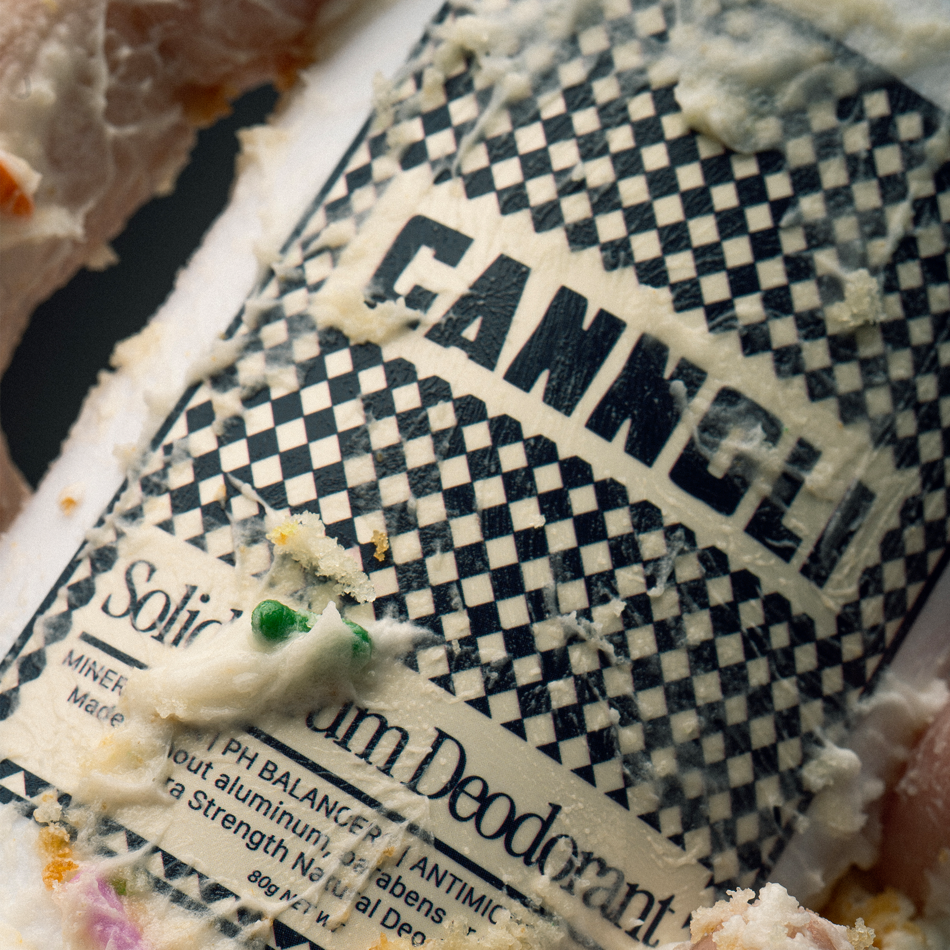 Close-up of a Cannoli Deodorant bar with visible branding and product details.