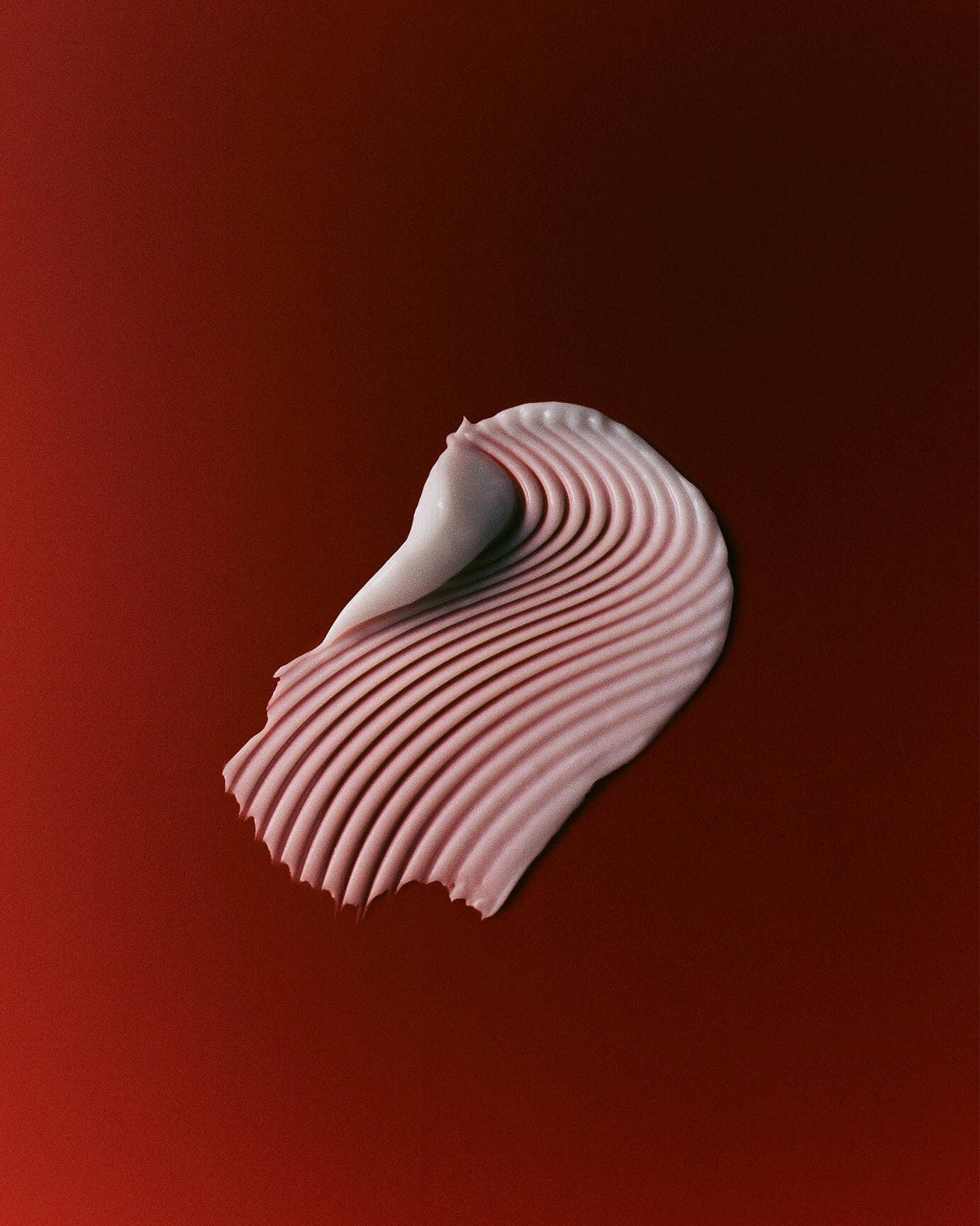 white cream spread on a red background