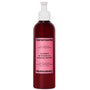 Ceremonia shampoo bottle with pink label on a white background