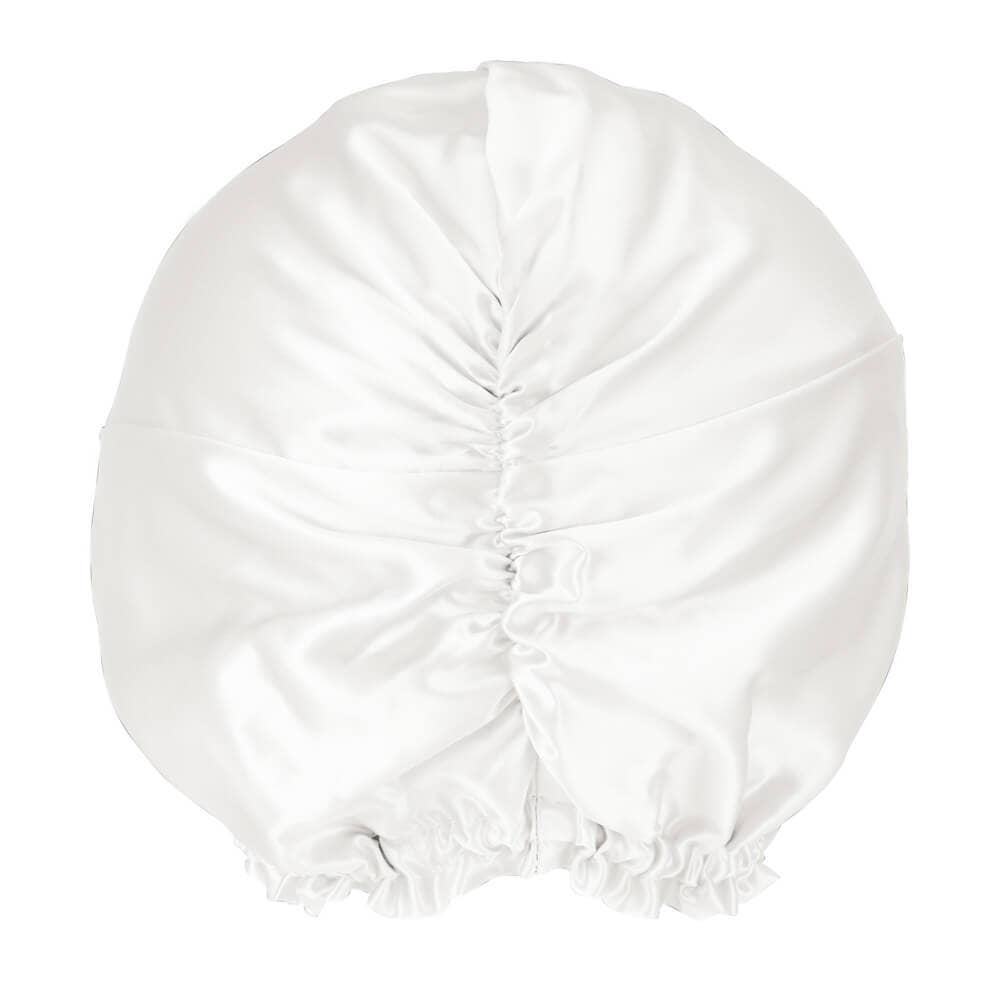 White silk bonnet on a white background