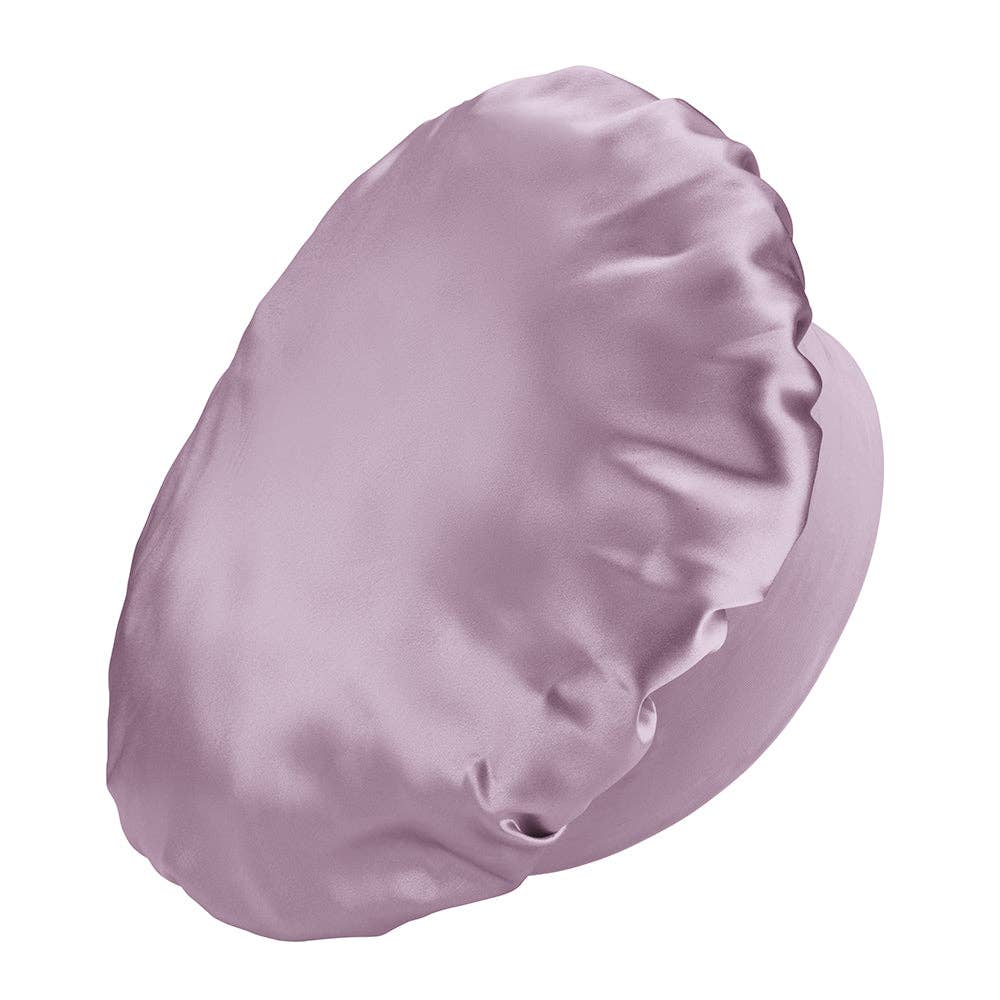 purple shower cap on a white background