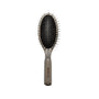 Hairbrush with black bristles on a white background